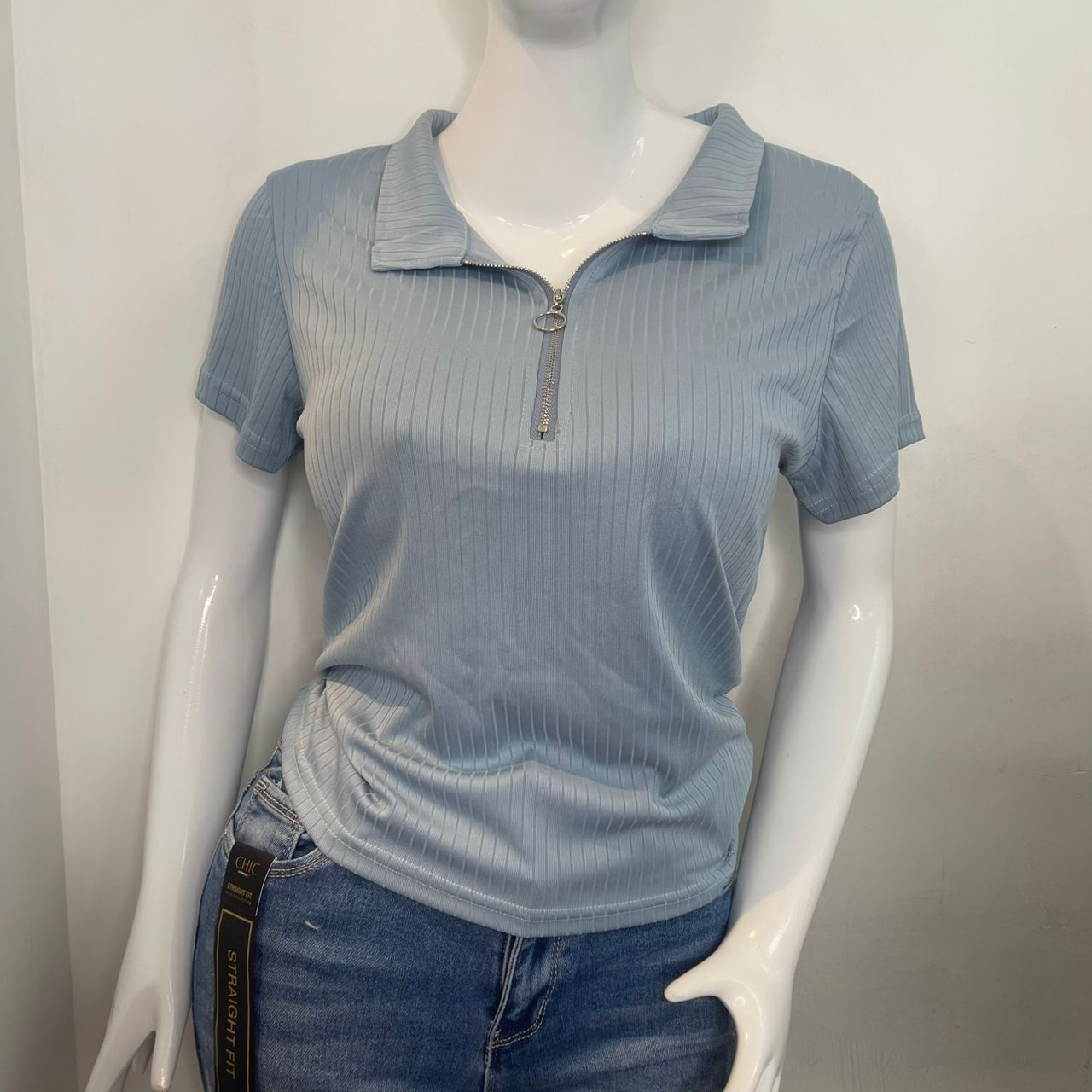 BLUSA CUELLO POLO V CIERRE CELESTE