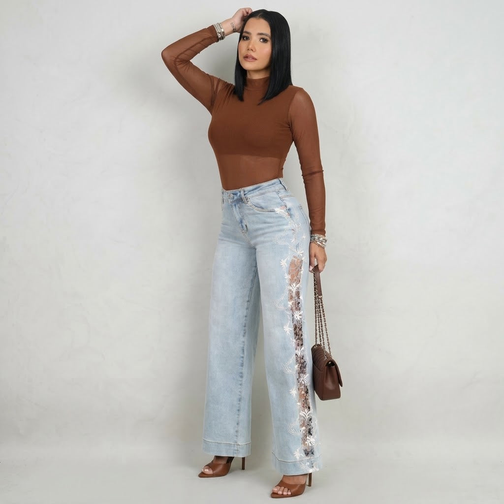 BLUSA CON TRANSPARENCIA MANGAS